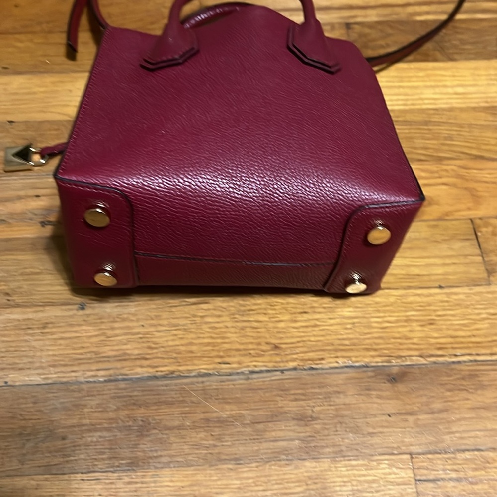 Michael Kors with tags. Women's Burgundy Handbag. 8 in by 9 in. - Picture 3 of 6